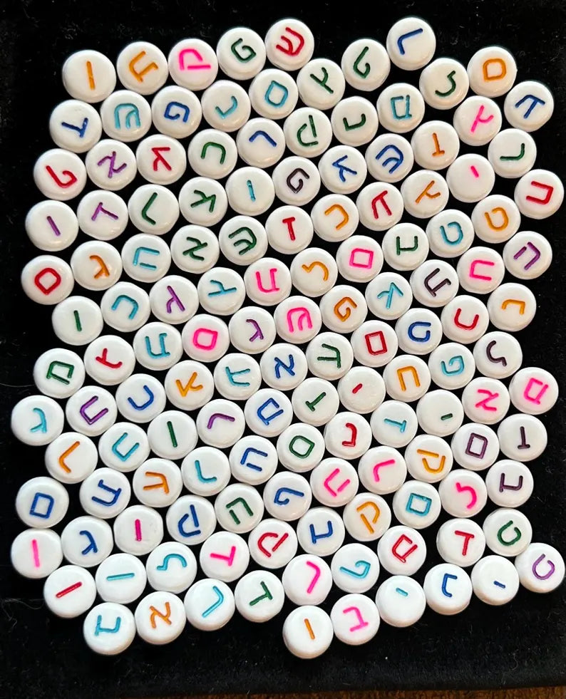 Colorful Hebrew alphabet letter beads, 7mm jewelry making supplies by Pretty Beans, displayed in new packaging for DIY jewelry projects.