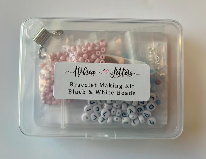 DIY Hebrew letter bracelet making kit by Pretty Beans featuring seed beads, silver charms, and tools for creating personalized jewelry.