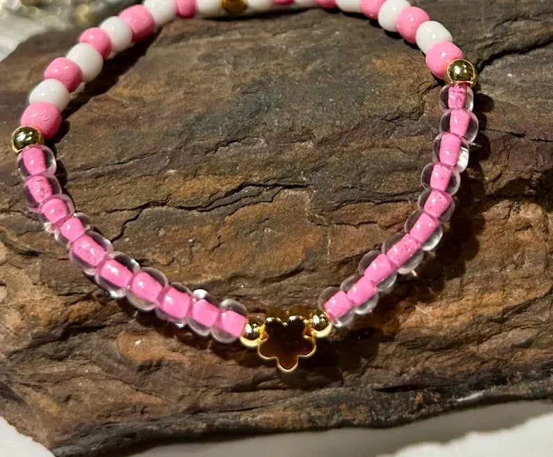 DIY Hello Kitty stretch bracelet making kit from Pretty Beans, includes colorful beads and tools for crafting jewelry.