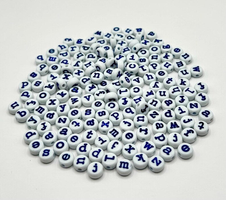 Light blue lowercase typewriter font alphabet beads with navy letters, 7mm, for jewelry making by Pretty Beans.