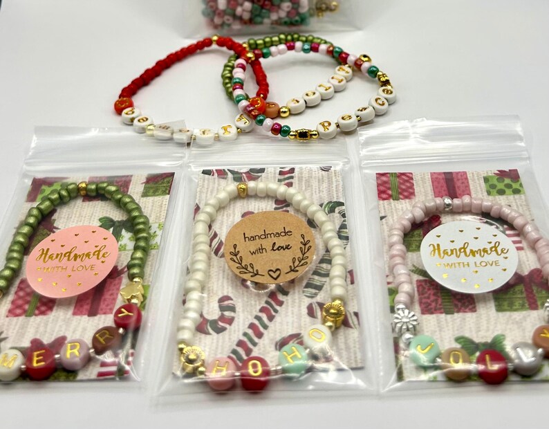 DIY holiday bracelet making kit by Pretty Beans with seed beads and lowercase alphabet beads for custom jewelry creation.