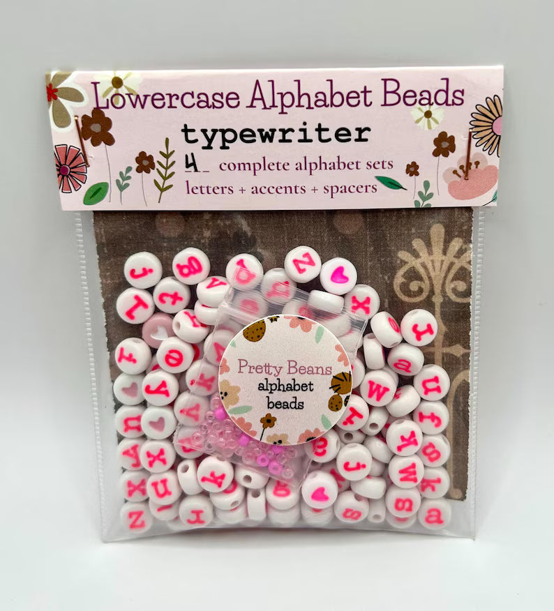 Hot pink lowercase alphabet beads in 7mm typewriter font, jewelry making supplies, 120-piece set from Pretty Beans.
