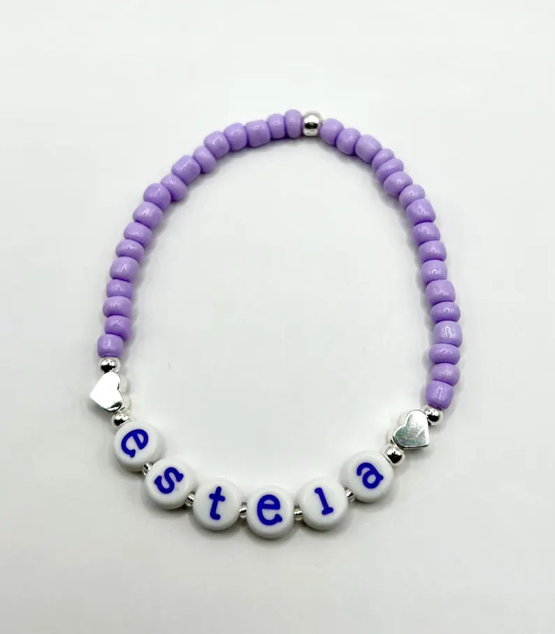 Colorful lowercase alphabet #2 beads in 7mm size from Pretty Beans, featuring vibrant letter beads for jewelry making.
